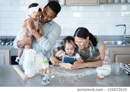 Happy family, kids and baking with cookie cutter to shape dough, flour and carrying baby in kitchen. Mom, dad and children cooking with parents, help and teaching dessert recipe for support in home 120072620