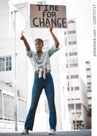 Feminism is for everybody. Shot of a young woman protesting in the city. Feminism is for everybody. Shot of a young woman protesting in the city. 120072717