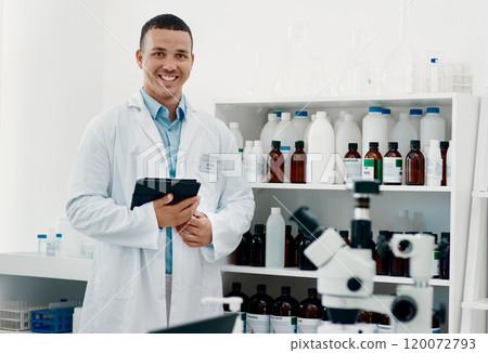 The world will remember his work. Portrait of a confident young scientist working in a modern laboratory. 120072793