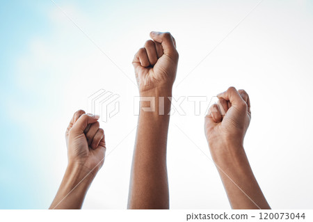 Women belong in all places where decisions are being made. Shot of an unrecognisable group of women raising her hand in strength outside. Women belong in all places where decisions are being made. Shot of an unrecognisable group of women raising her hand in strength outside. 120073044