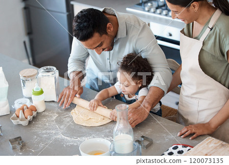 Family, baking and help kid with rolling pin for dough, flour and toddler learning in kitchen. Mom, dad and child cooking with parents and teaching girl dessert recipe for support in home together Family, baking and help kid with rolling pin for dough, flour and toddler learning in kitchen. Mom, dad and child cooking with parents and teaching girl dessert recipe for support in home together 120073135