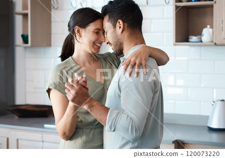 Happy couple, hug and dancing with love in kitchen for bonding, support or embrace together at home. Young, man and woman with smile or affection for romance, holiday or weekend in comfort at house Happy couple, hug and dancing with love in kitchen for bonding, support or embrace together at home. Young, man and woman with smile or affection for romance, holiday or weekend in comfort at house 120073220