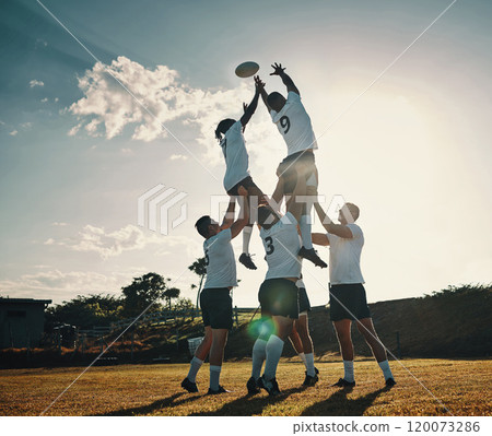 Whose ball is it. Full length shot of two handsome young rugby players catching the ball during a lineout on the field. Whose ball is it. Full length shot of two handsome young rugby players catching the ball during a lineout on the field. 120073286