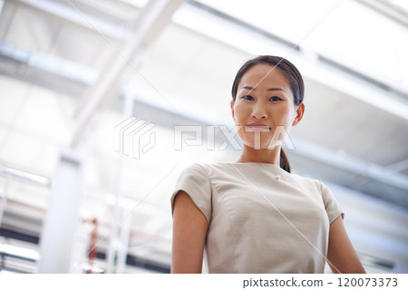 Business, confidence and portrait of happy woman in office with ambition, opportunity or professional pride. Creative, consultant or Asian businesswoman in workplace with trust, smile and low angle. Business, confidence and portrait of happy woman in office with ambition, opportunity or professional pride. Creative, consultant or Asian businesswoman in workplace with trust, smile and low angle. 120073373