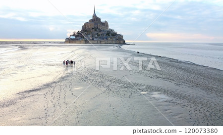 Aerial View of Group Walking to Mont Saint Michel, Normandy 120073380