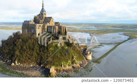 Mont Saint Michel Abbey Surrounded by Tidal Waters 120073401
