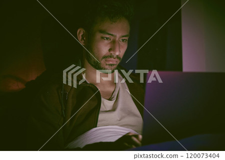 Depression, movie and laptop at night in home with watching, tired and streaming with mental health of jobless man. Sad, fatigue and insomnia with tech and digital addiction in dark living room 120073404