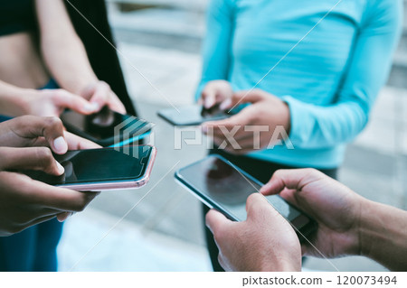 Health, phone and hands of people in city for running app, online syncing and fitness community. Social media, networking and teamwork with friends for communication, sports blog and workout 120073494