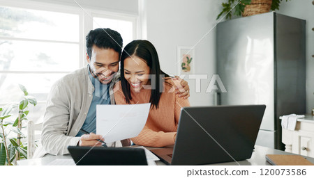 Kitchen, couple and hug with laptop for finance, track expenses and success for budget goals. Happy, man or woman with tax document for accounts management, savings or mortgage review at home 120073586