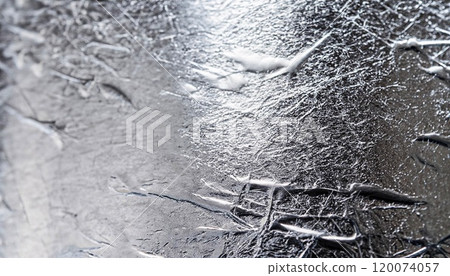 macro photo of silver surface of metallic smooth foil with metal texture macro photo of silver surface of metallic smooth foil with metal texture 120074057