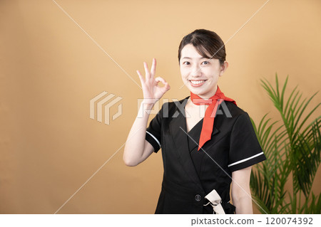Esthetician smiling with okay sign Esthetician smiling with okay sign 120074392