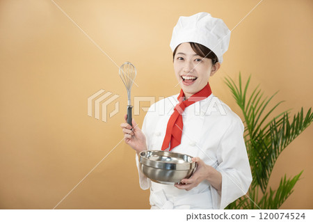 Chef with beige bag, whisk and bowl 120074524