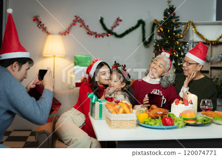 Dinner and Family holiday celebrating, together at Merry Christmas and  New Year. 120074771