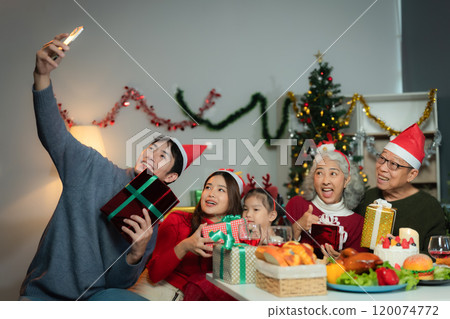 Dinner and Family holiday celebrating, together at Merry Christmas and  New Year. 120074772