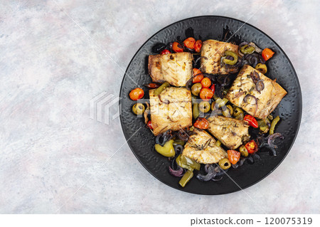 Roasted fish fillet and baked vegetables. 120075319