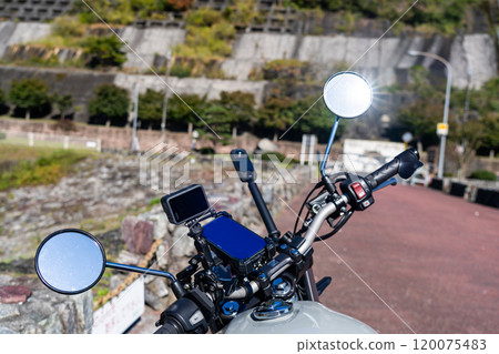 A motorcycle carrying video recording equipment A motorcycle carrying video recording equipment 120075483
