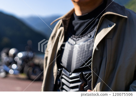 Bike rider wearing protective gear Bike rider wearing protective gear 120075506