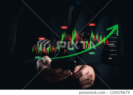 businessman analyzes stock market trends on a smartphone, observing buy and sell indicators with a bullish trend. Ideal for financial technology and investment marketing. 120076679