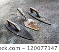 Wooden shoes and cement spoons 120077147