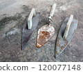 Wooden shoes and cement spoons 120077148