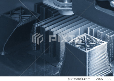 Close up scene the additive manufacturing by 3D printer machine in the light blue scene. Close up scene the additive manufacturing by 3D printer machine in the light blue scene. 120079099