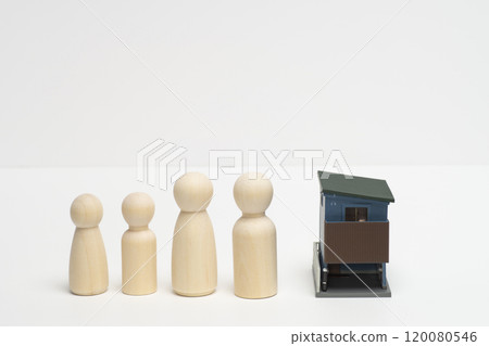 Image of a family and their home with a sloped roof Image of a family and their home with a sloped roof 120080546