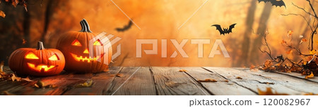 Autumn Halloween setting with carved pumpkins and flying bats at sunset in a forest Autumn Halloween setting with carved pumpkins and flying bats at sunset in a forest 120082967