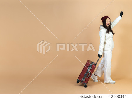 Energetic Holiday Explorer with Trendy Luggage Showcasing Contemporary Travel Fashion and Adventure Spirit in Elegant Studio Portrait Setting Energetic Holiday Explorer with Trendy Luggage Showcasing Contemporary Travel Fashion and Adventure Spirit in Elegant Studio Portrait Setting 120083443