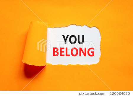 Belonging and you belong symbol. Concept words You belong on beautiful white paper. Beautiful orange paper background. Business belonging and you belong concept. Copy space. 120084020