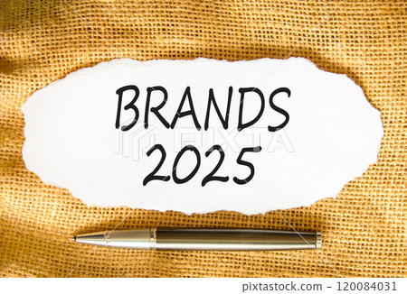 Planning brands 2025 new year symbol. Concept words Brands 2025 on beautiful white paper. Beautiful canvas background. Beautiful metallic pen. Business brands 2025 new year concept. Copy space. 120084031
