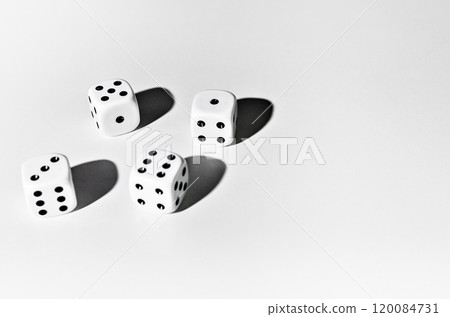 Top view of four dice on white background with space for text Top view of four dice on white background with space for text 120084731