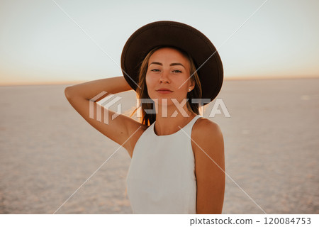 portrait of young tanned blonde European woman 120084753