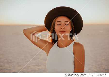 portrait of young tanned blonde European woman 120084754