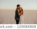 pink Lemurian lake, romantic photoshoot of young couple in love 120084808
