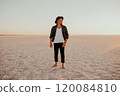 portrait of young tanned blonde European courageous man with beard barefoot 120084810