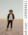 portrait of young tanned blonde European courageous man with beard barefoot 120084811
