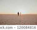 pink Lemurian lake, romantic photoshoot of young couple in love 120084816