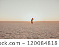 pink Lemurian lake, romantic photoshoot of young couple in love 120084818