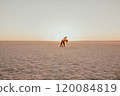 pink Lemurian lake, romantic photoshoot of young couple in love 120084819