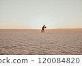 pink Lemurian lake, romantic photoshoot of young couple in love 120084820