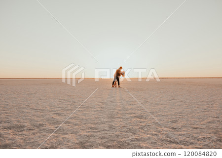 pink Lemurian lake, romantic photoshoot of young couple in love 120084820