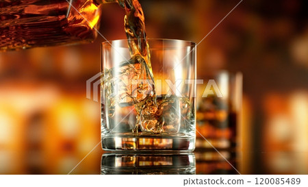 Freeze Motion of Pouring Whiskey into Glass with Ice. Freeze Motion of Pouring Whiskey into Glass with Ice. 120085489