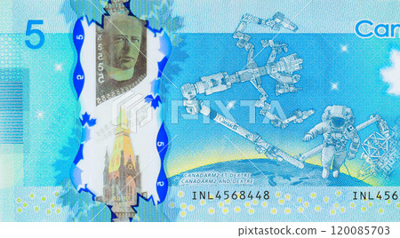 Bank of Canada issued by polymer banknotes in five dollar denominations back view Bank of Canada issued by polymer banknotes in five dollar denominations back view 120085703