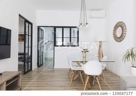 A Beautiful living room interior in new luxury home with open concept floor plan 120087177