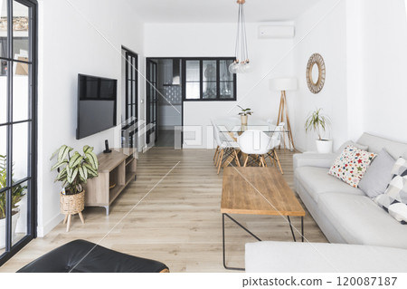 A Beautiful living room interior in new luxury home with open concept floor plan 120087187