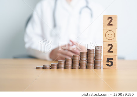 Happy New Year 2025 with Doctor, coins stack and Smile block. Money for Healthcare cost, Money Saving, Health Insurance, Medical, review and good Financial concept 120089190