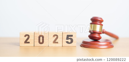 Happy New Year 2025 with judge gavel on table. Law, lawyer, judgment, justice auction and bidding concept 120089222