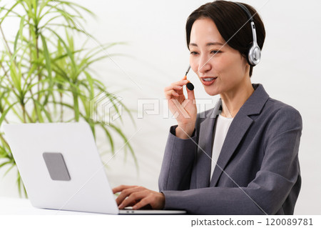 Young woman wearing a business suit Business image 120089781