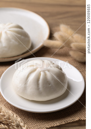 Asian steamed bun stuffed with pork and egg 120089885