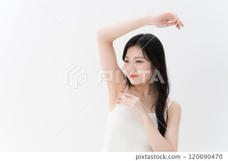 Hair removal/beauty: Young woman concerned about her armpits, upper body Hair removal/beauty: Young woman concerned about her armpits, upper body 120090470